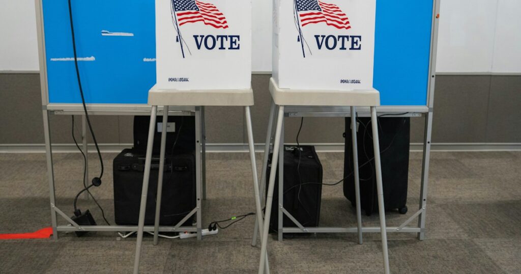Empty voting booths ready for voters at a Colorado polling place